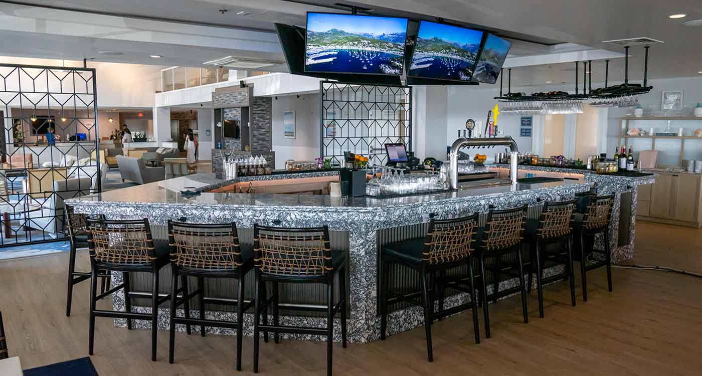 2023 Fabricator of the Year Glenn Kross. A fully wrapped bar in Cambria Surfaces.
